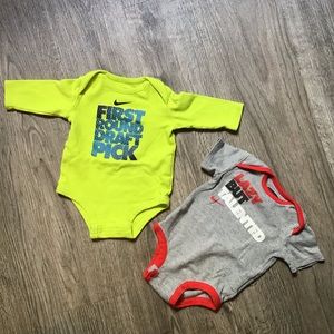 2 NIKE Onesies
